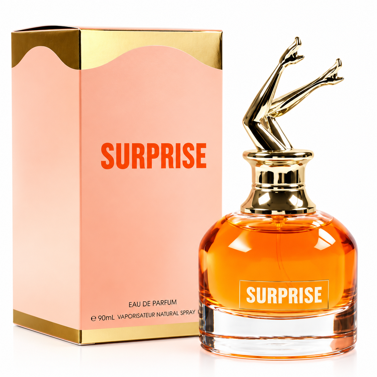 A bottle of Surprise Eau de Parfum with its matching pink and gold box, featuring a gold cap shaped like legs and filled with amber-colored fragrance liquid.