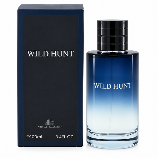 A 100ml bottle of Ard Al Za'faran Wild Hunt cologne next to its dark navy blue packaging box, set against a plain white background.