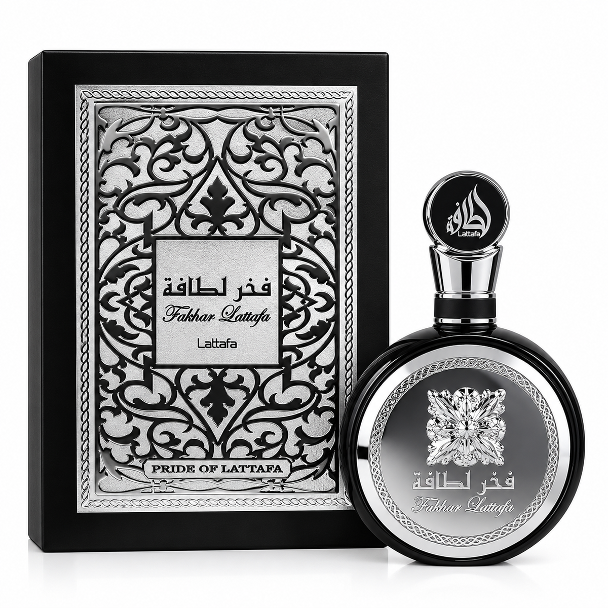 A bottle of Fath al-Haqqa by Laftafa perfume next to its ornate black and silver presentation box, set against a plain white background.