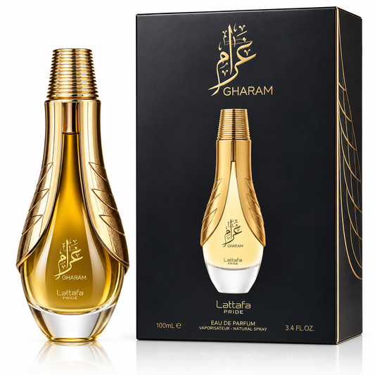Gharam Lattafa Pride Eau de Parfum bottle in a metallic gold finish with a clear glass base, shown next to its black and gold packaging box.