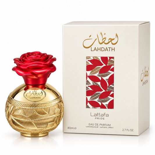 Lattafa Pride perfume bottle with a red rose cap and gold textured body, shown next to its cream-colored packaging box with gold and red leaf patterns.