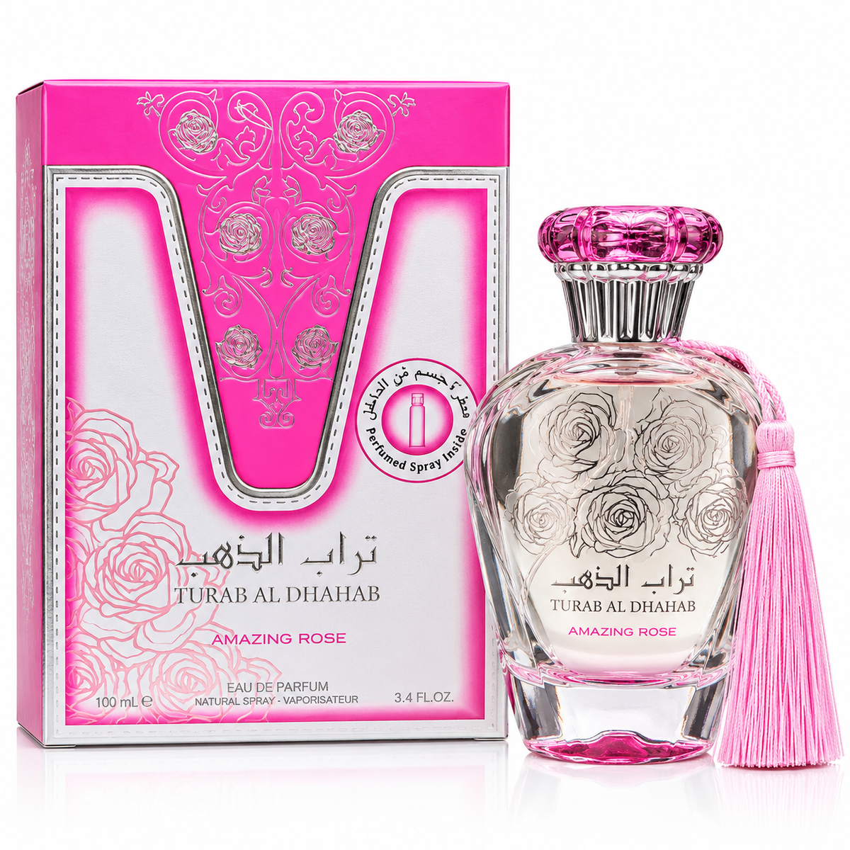 Turab Al Dha'hab Amazing Rose perfume bottle and its pink packaging box, featuring rose engravings, a pink tassel, and Arabic text on a white background.